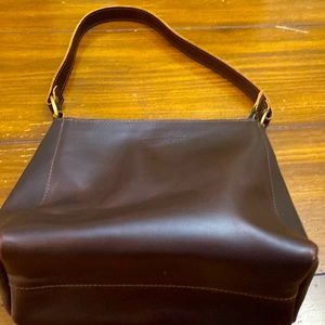 Triangle leather shoulder bag